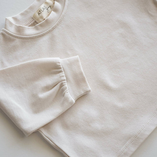 Camiseta orgánica de manga larga de gran tamaño: vainilla