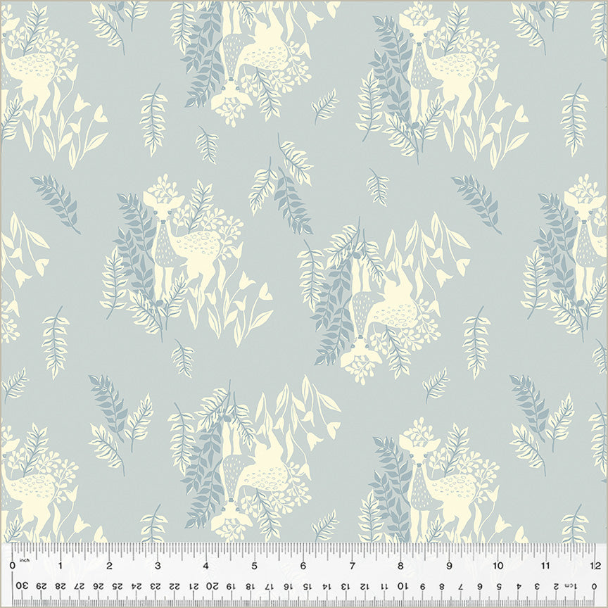Pattern of deer and leaves on a light blue background with a ruler at the bottom.