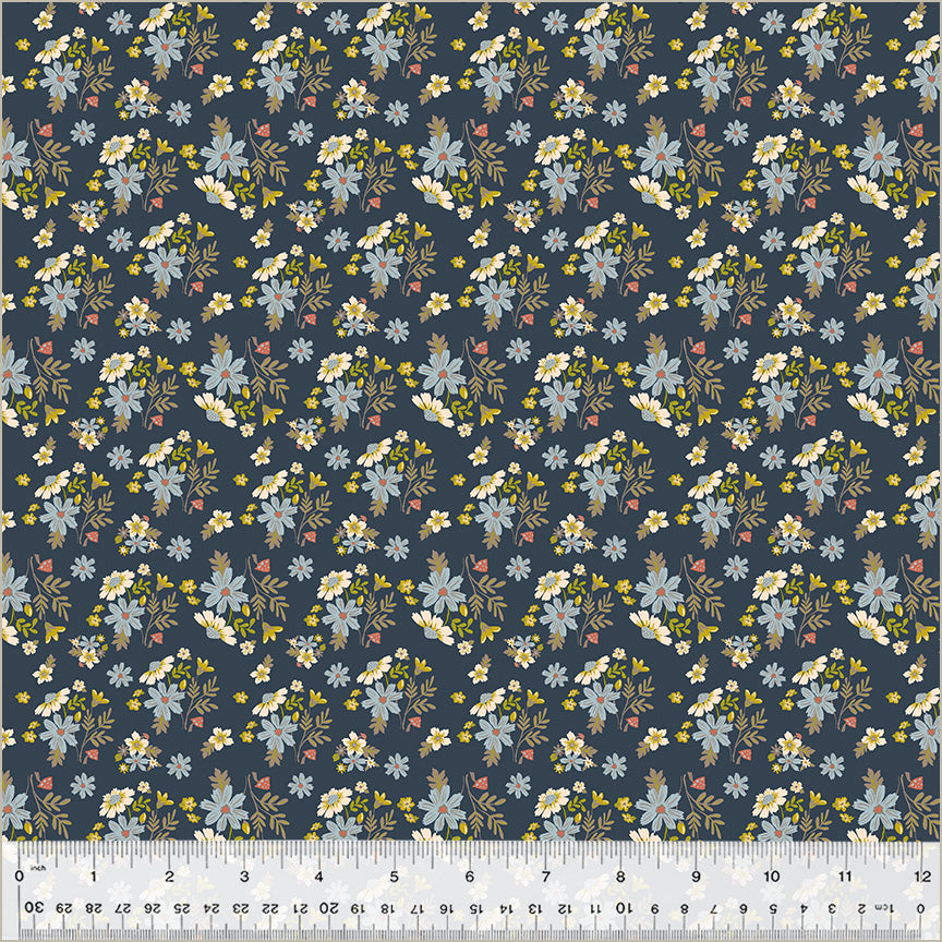 Floral pattern fabric with a ruler at the bottom for scale.