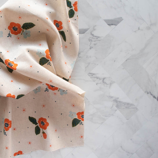 Popelín orgánico de mandarina Big Blooms