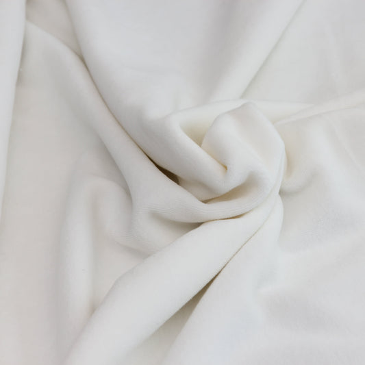 Organic cotton velour fabric swatch showing 50% stretch and medium weight quality