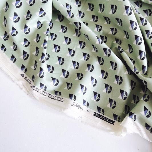 Satén orgánico con flores decorativas