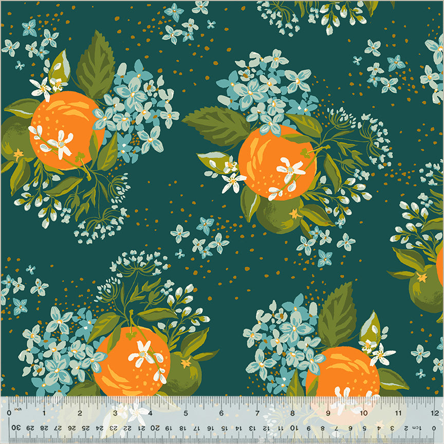 Pattern of oranges and flowers on a teal background with a ruler at the bottom.
