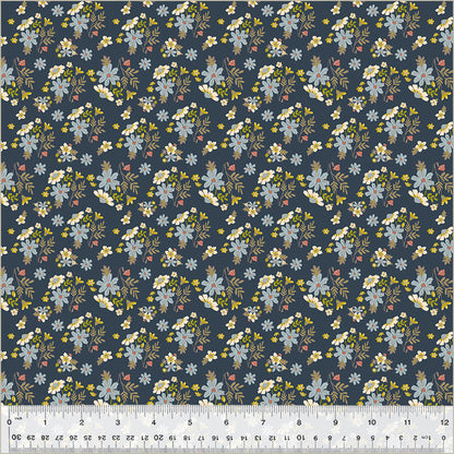Floral pattern fabric with a ruler at the bottom for scale.