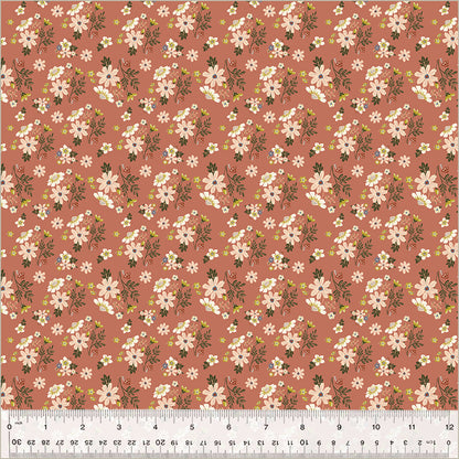 Floral pattern fabric with a ruler at the bottom for scale