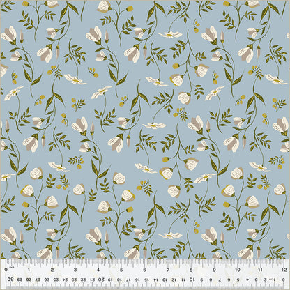 Floral pattern with white flowers and green leaves on a blue background, with a ruler at the bottom.