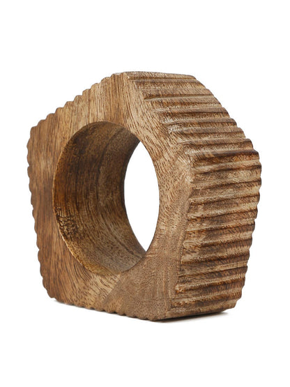 Wooden napkin ring with textured surface on a white background