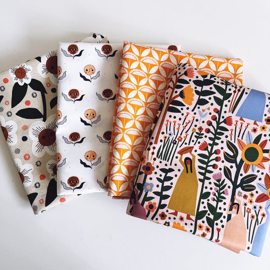 Assorted cotton and linen fabrics from grab bag, perfect for quilting and sewing projects