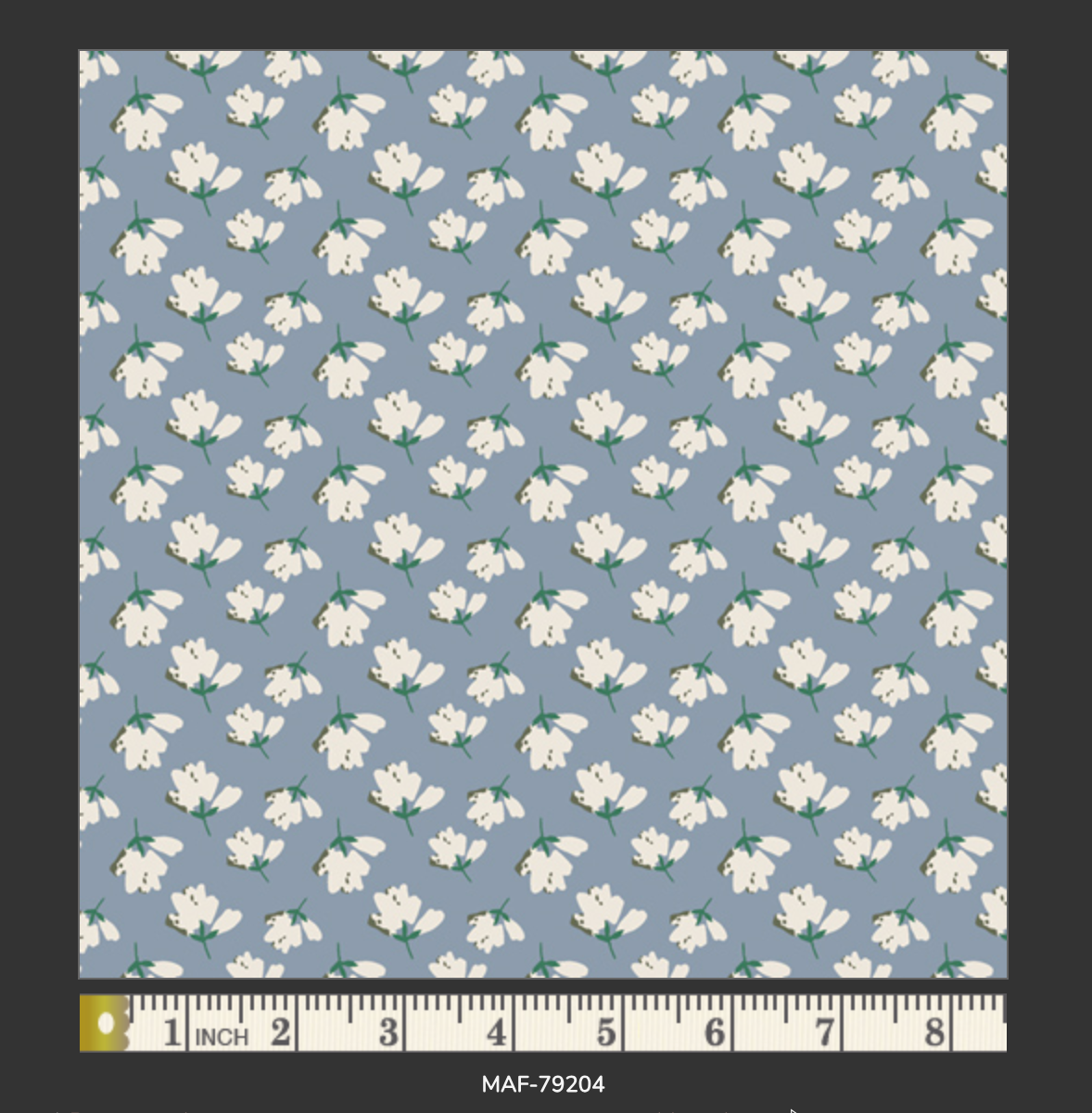 Pattern of white flowers on a blue background with a ruler at the bottom.
