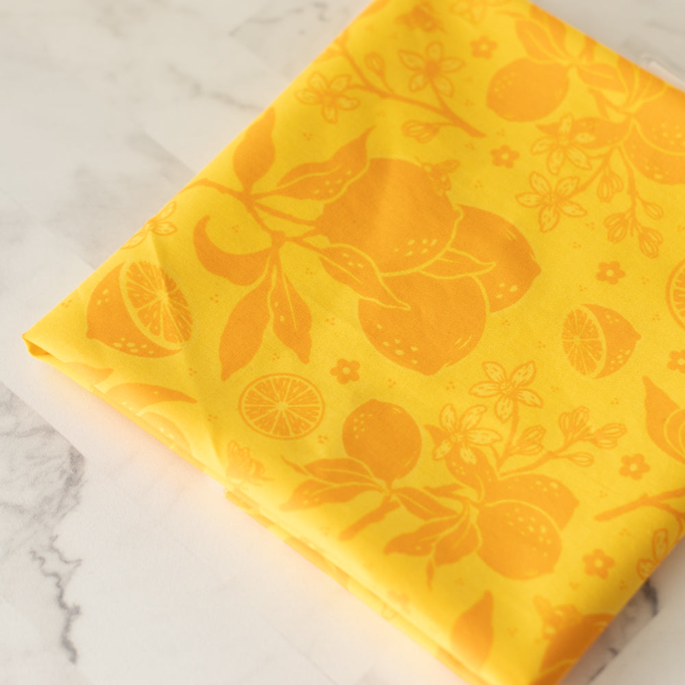 Popelín orgánico naranja con tonos cítricos