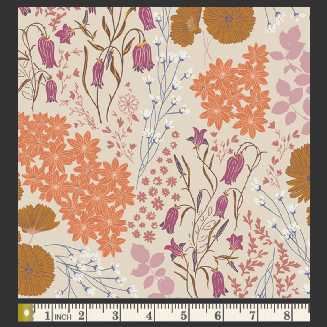 Floral patterned fabric swatch with a ruler at the bottom
