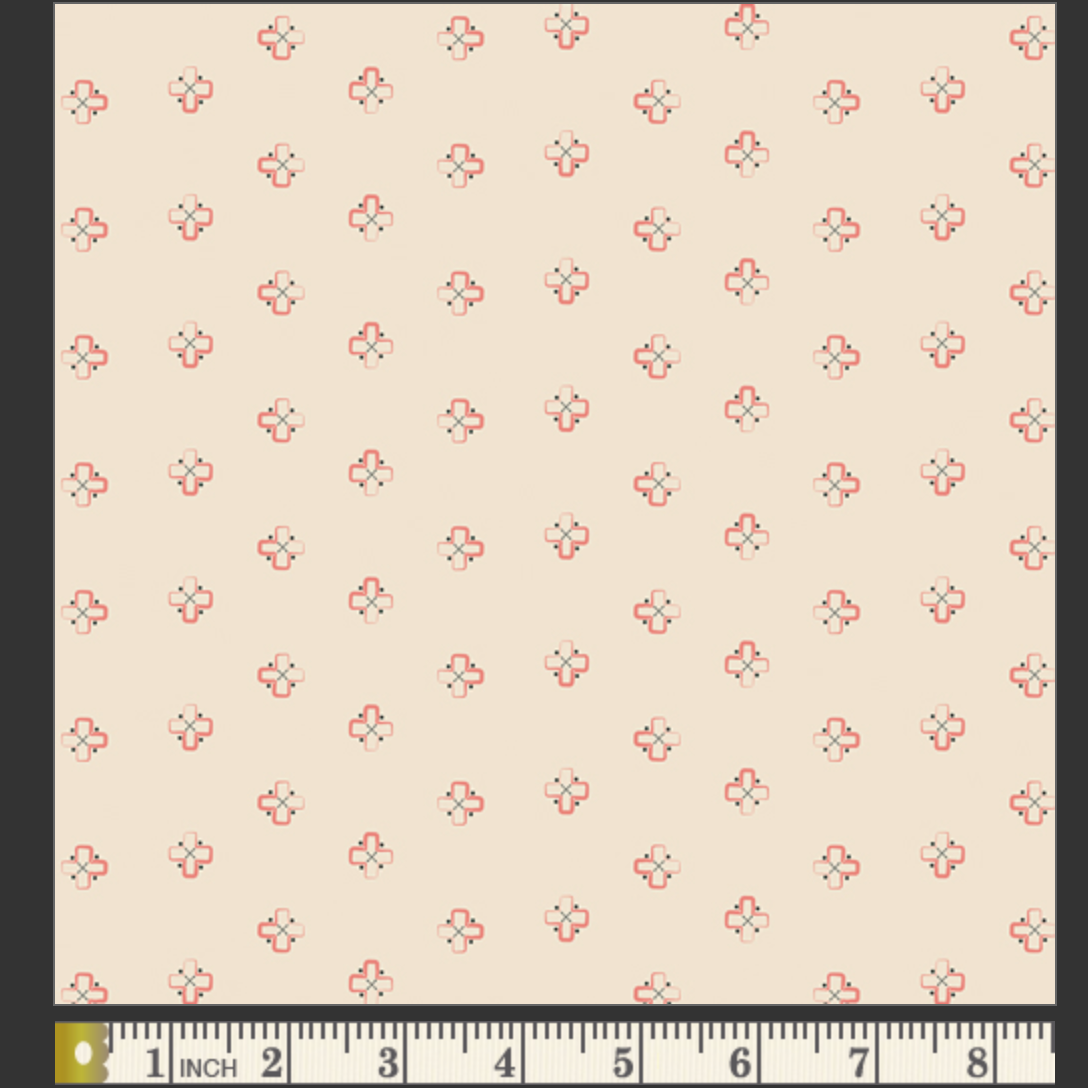 Patterned fabric swatch with a ruler at the bottom for scale, on a beige background.