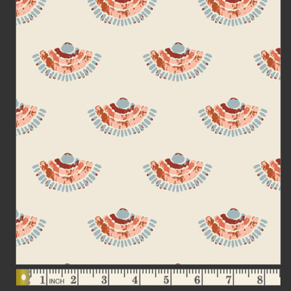 Patterned fabric swatch with a ruler at the bottom