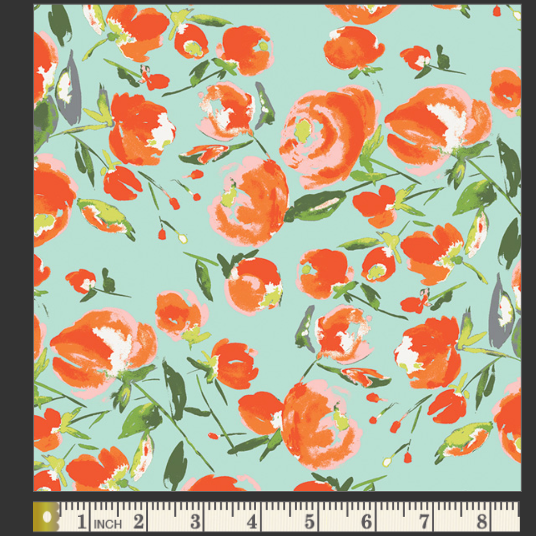 Floral pattern with red and pink flowers on a light blue background, featuring a ruler at the bottom.