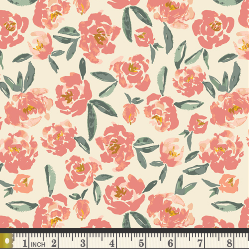 Floral pattern with pink flowers and green leaves on a beige background, ruler at the bottom for scale.