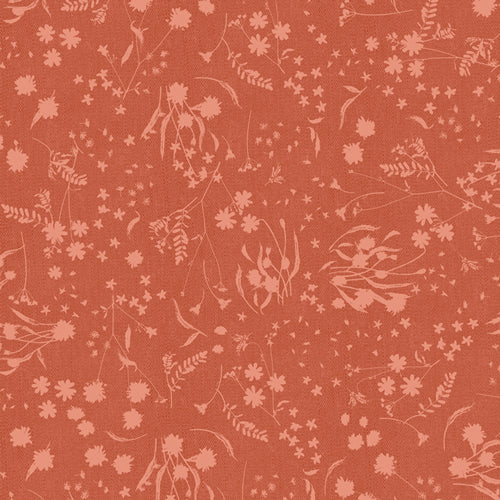 Floral pattern on a red-brown background